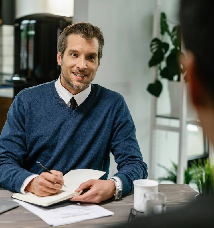 financial-consultant-planning-home-finances-with-his-client-.jpg